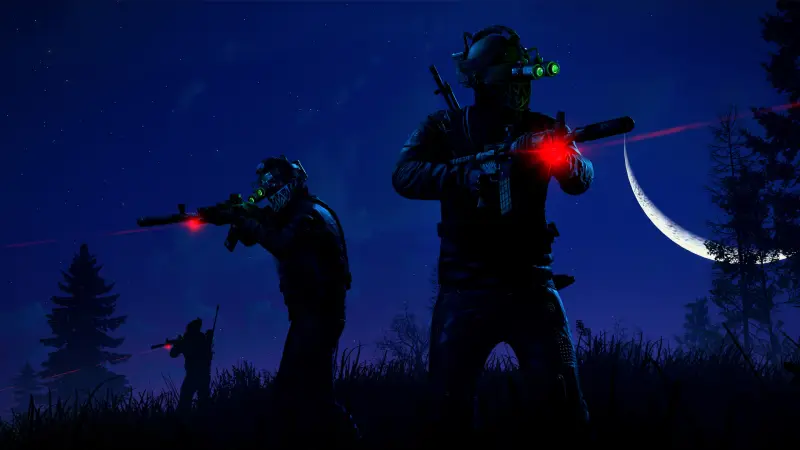 Two Rust players in night-vision goggles aiming laser-sighted rifles in the dark